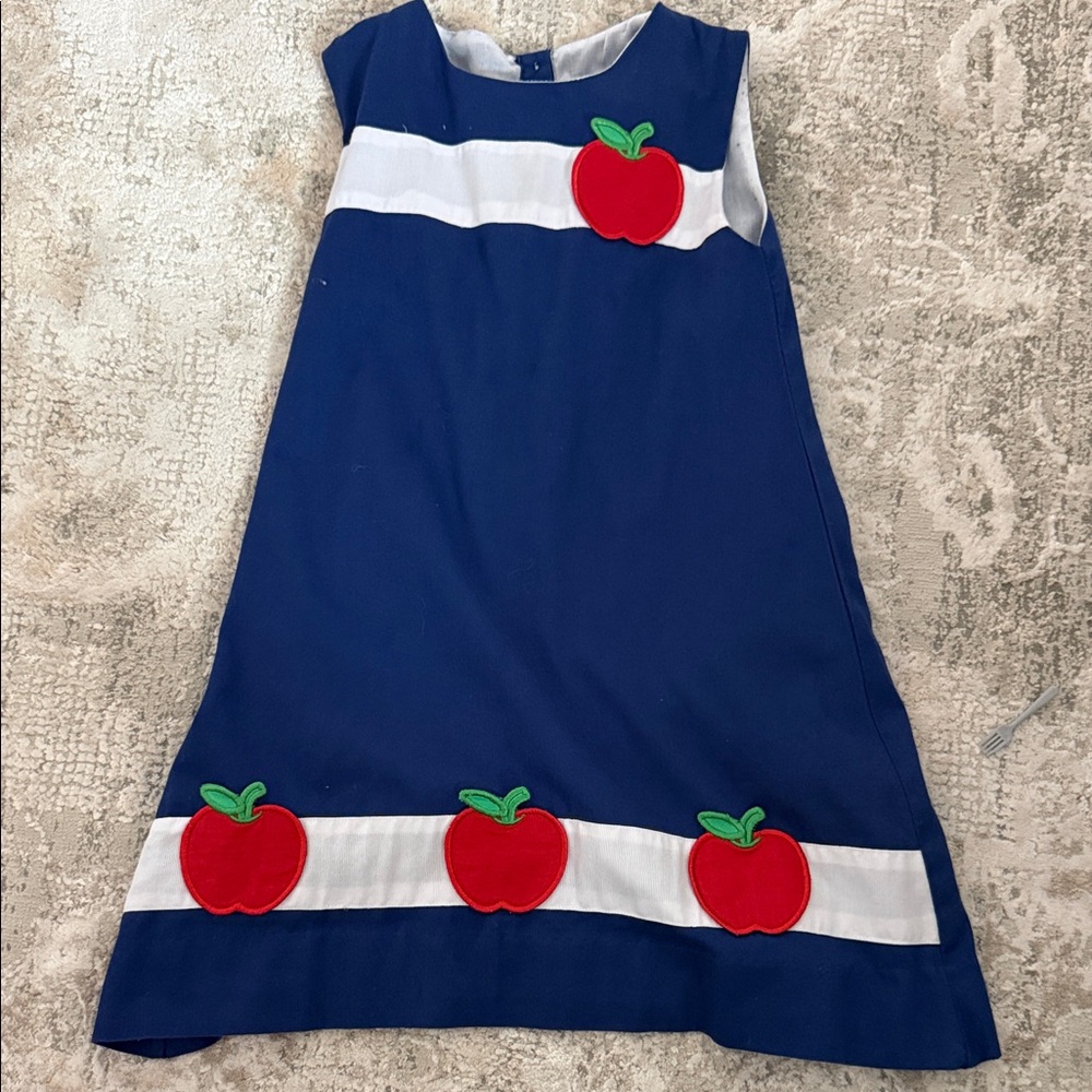 Elizabeth and James Blue Dress with Red Apple Details